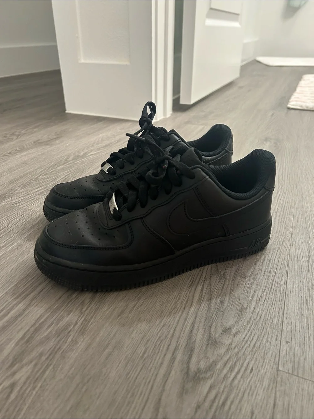 Nike All-Black Air Force 1’s Sneakers